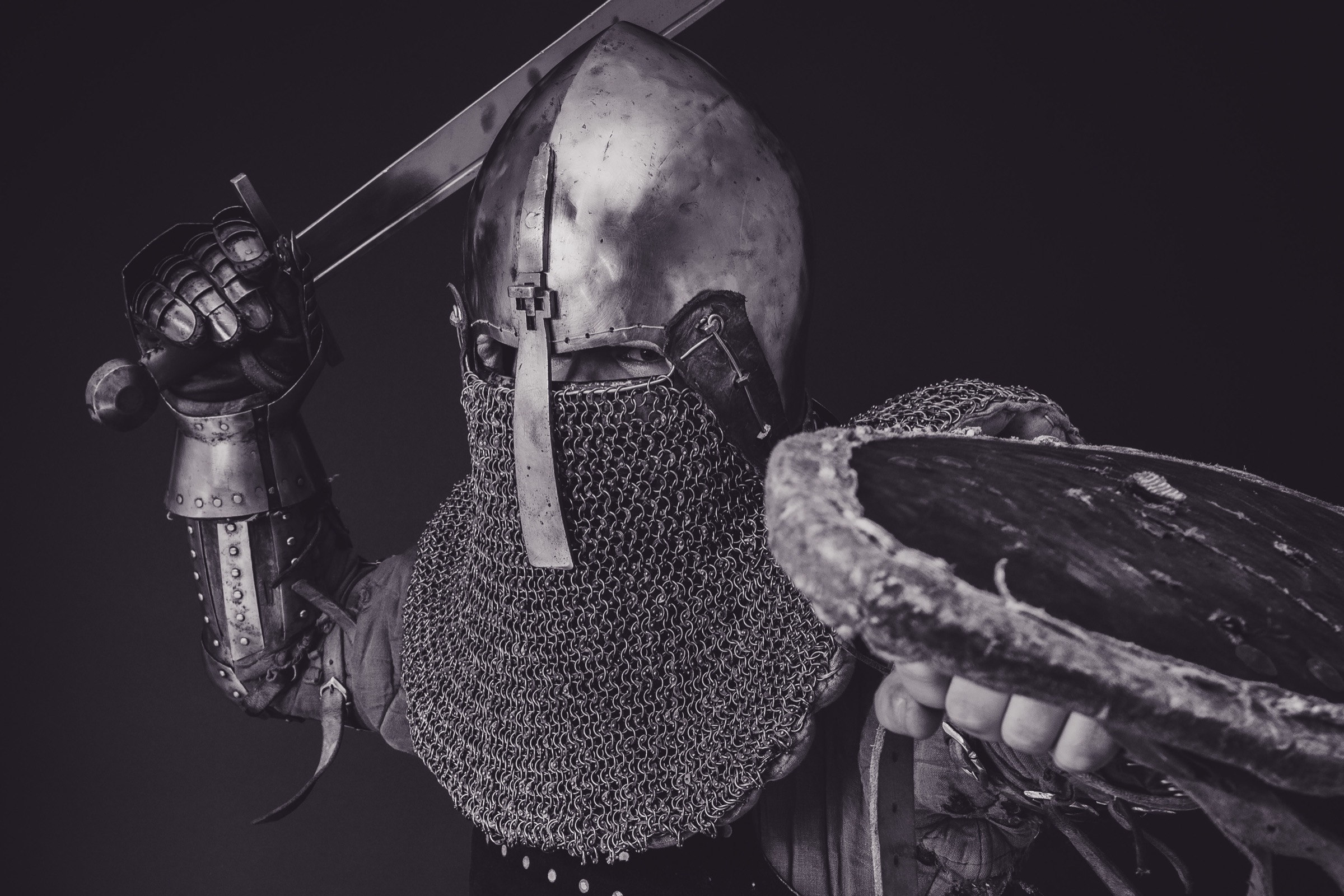 HEMA practitioner in full protective gear with sword