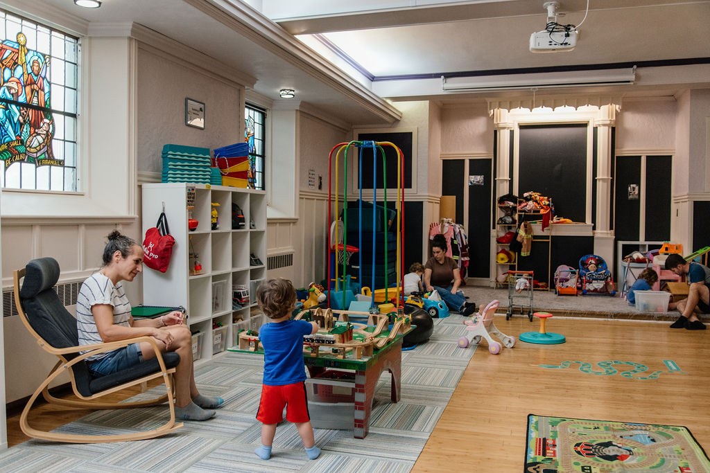 Families playing together in the Melrose Family Room